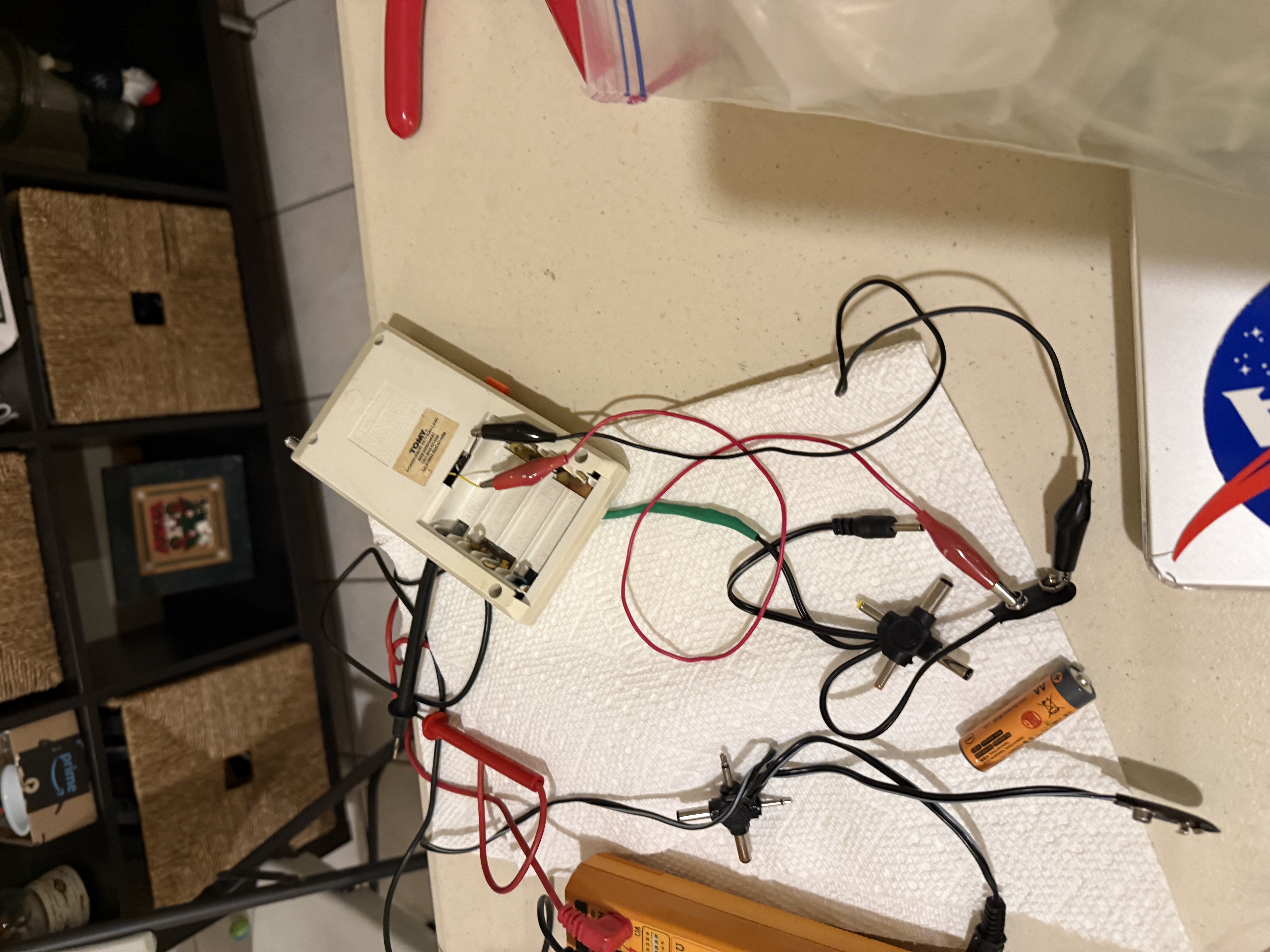 Tomy Omnibot remote control being repaired